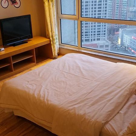 Dalian Yidian Yijing Huayuan Apartment Номер фото