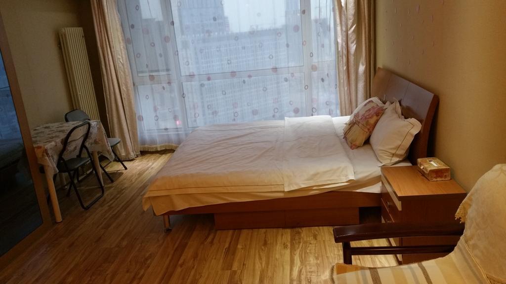 Dalian Yidian Yijing Huayuan Apartment Номер фото